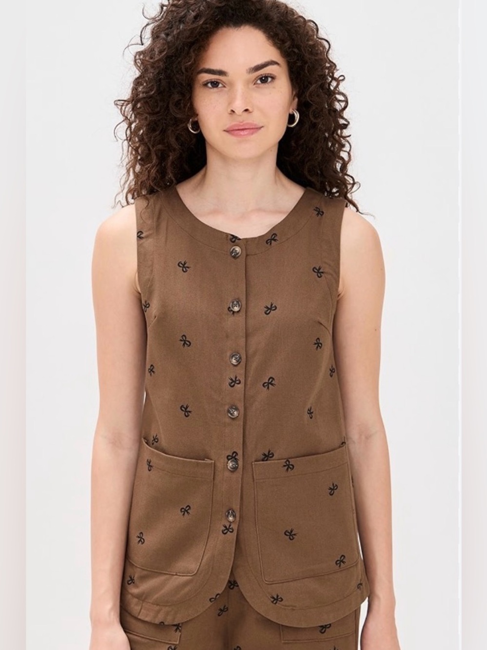 NWT Little Lies 2 pocket Sleeveless Brown Button Front Bow Print Vest size Small